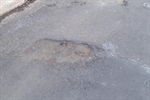 Operação tapa-buracos na rua Amparo é solicitada na indicação 1696
