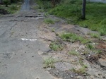 Situação do asfalto na rua Adamantina