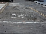 Situação do asfalto na rua Itaim